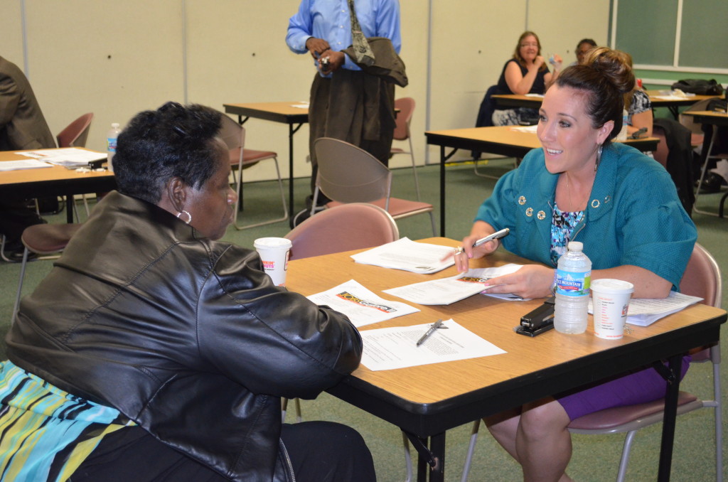 A job seeker practices her interviewing skills