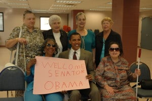 Barack Obama visits with several Lighthouse clients