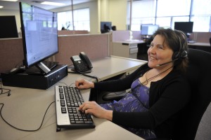 A blind woman works as a customer call agent