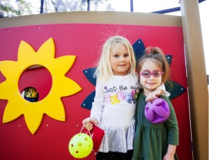 Matilda posing with a friend on the playground