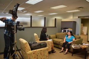 Sandy Murillo who writes Sandy's View for The Lighthouse is interviewed and filmed by CBS News