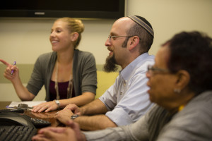 Dr. Joseph Wallach conducts a small group counseling session