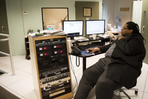 Brian Hawkins at the control desk in CRIS Radio