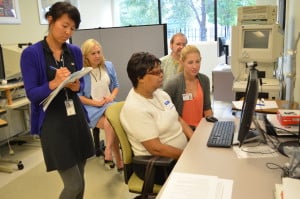 The Low Vision Research Team evaluates a patient's ability to track words on a computer screen