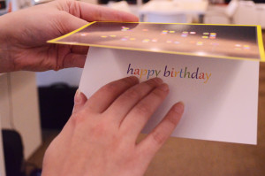 close up of an inBraille Greeting card where the message inside is displayed both in traditional text and Braille