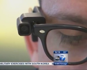 Luke Scriven wearing the OrCam device for an ABC 7 segment