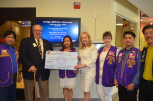 Dr. Janet Szlyk with members of the Chicago Filipino-American Lions Club at The Lighthouse