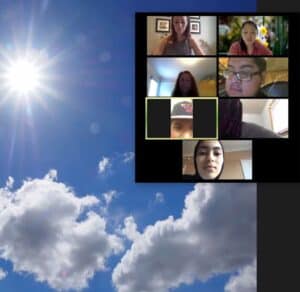 Past participants on a zoom call, discussing their photographs
