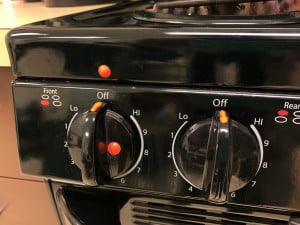 Orange bump dots are shown on a stove