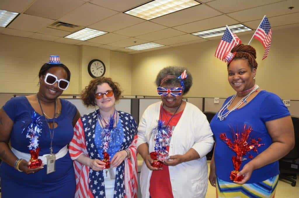 Carly (second left) celebrates Independence Day with her colleagues at The Chicago Lighthouse! Shown left to right are Kameshia Damon of the Advocate Customer Care Center; Carly; Deborah Miles of the Cook County Customer Care Center; and Meredith Hubert of the IDFPR (Illinois Department of Financial and Professional Regulation) Customer Care Center.