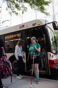 A young woman who is blind travels independently using public transportation
