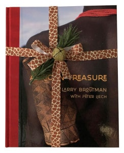 African Treasure book with ribbon tied around it as a present