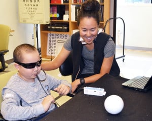 Brainport patient testing out device with Meesa Royster