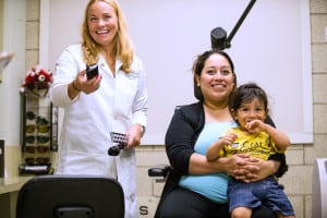 Dr. Kara Crumbliss performs a comprehensive vision exam on a patient in the Low Vision Clinic at The Chicago Lighthouse.
