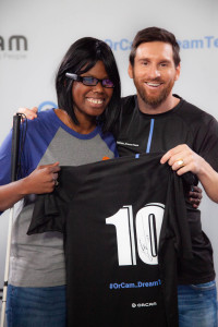 Kalari and Messi holding a jersey signed by Messi
