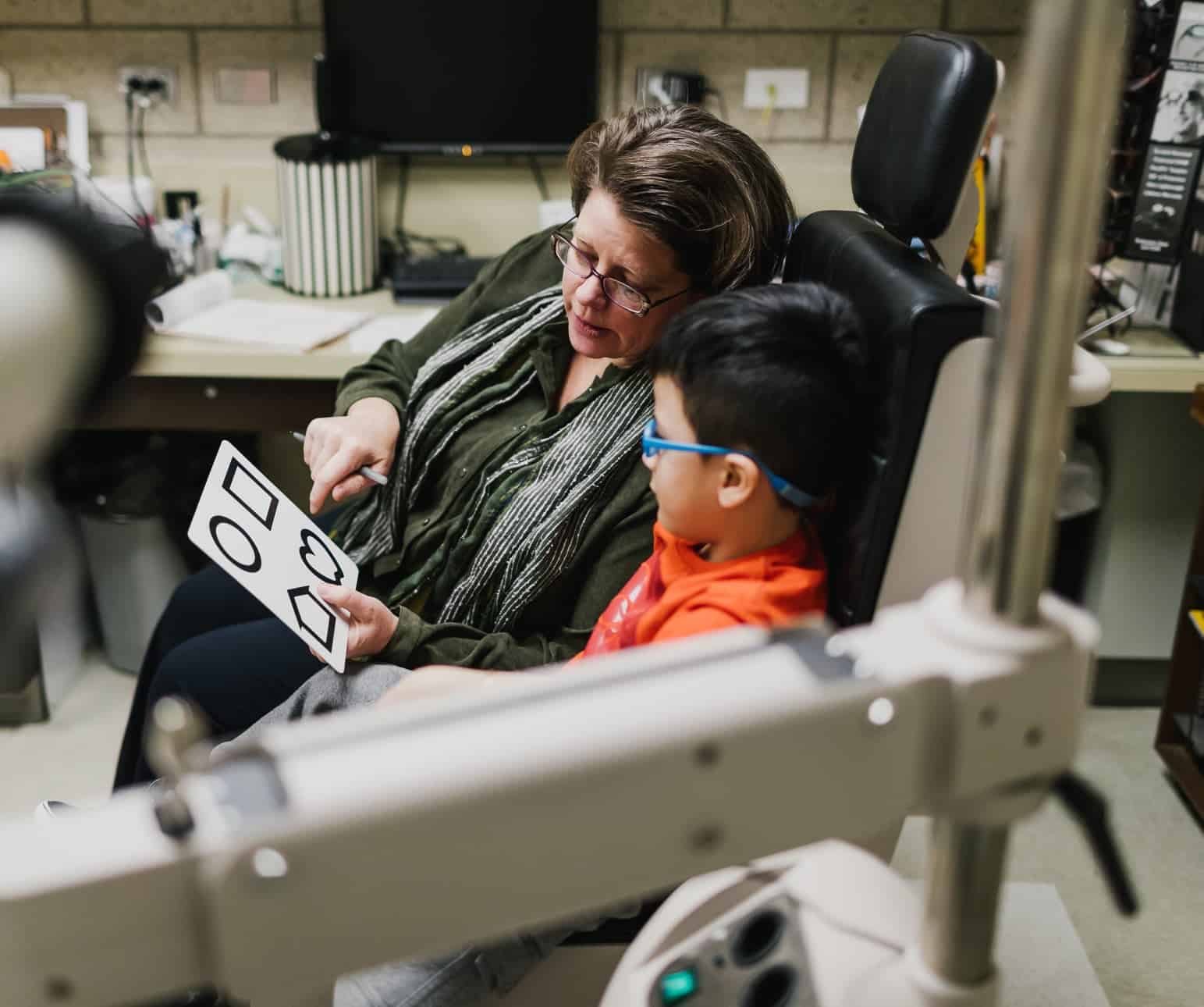 doctor matchinski and a young patient during an eye exam
