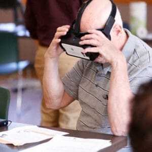 Visually impaired man uses sight headset