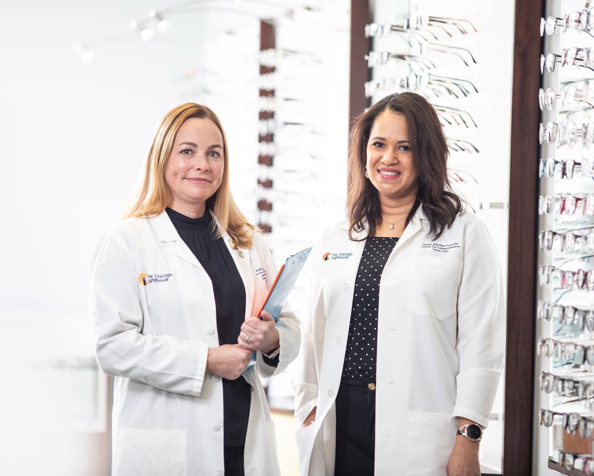 Dr. Kara Crumbliss, Optometrist and Senior Vice President of Clinical Services, and Dr. Patricia Grant, Vice President of Research, are pictured in our Low Vision Clinic.