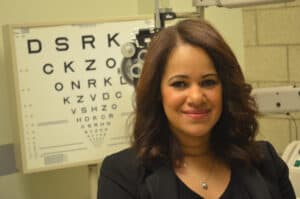Headshot of Patricia Grant In front of an eye test
