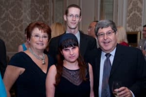 Ruth, Mike, Lauren and Steve Ross pose in formal attire