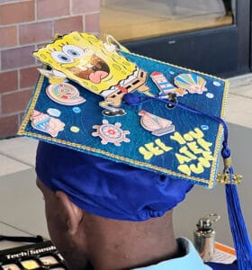 Graduate hat with Spongebob on it reads: "See you later dude!"
