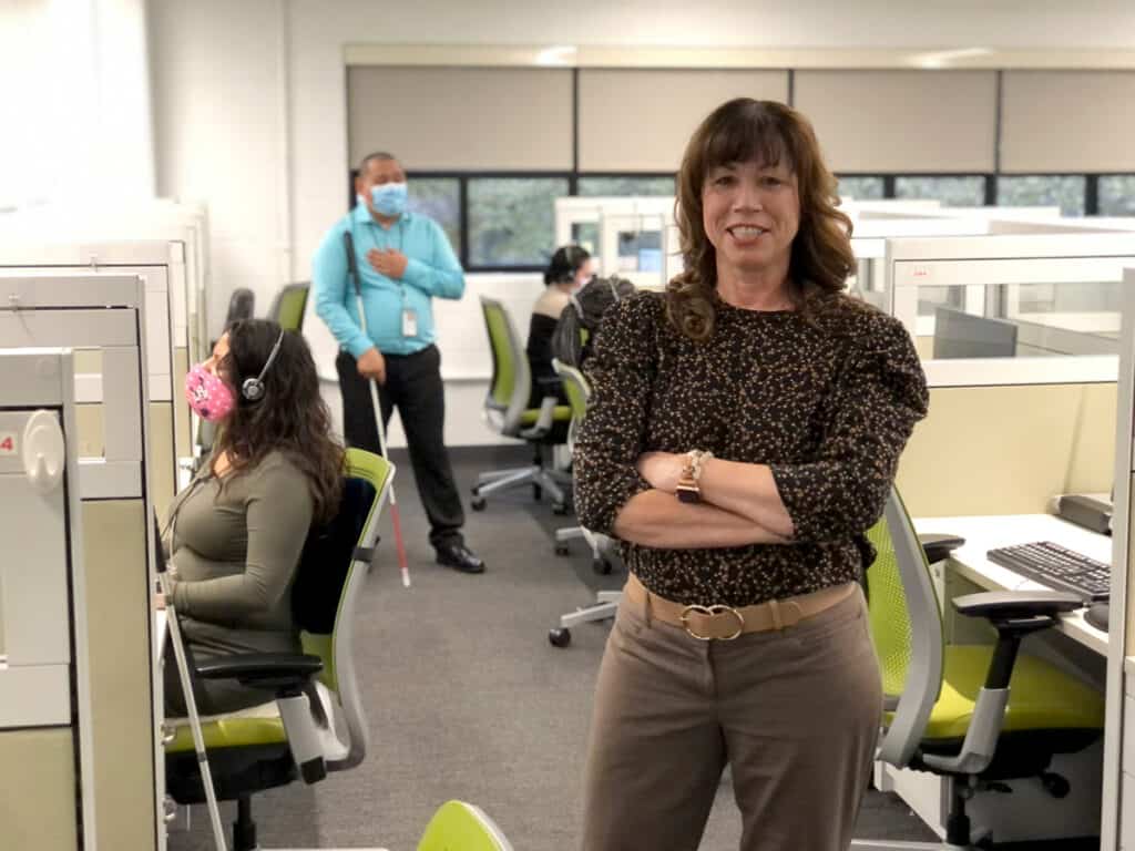 Kathy Stoeberl poses for a photo in the UI Health Contact Center