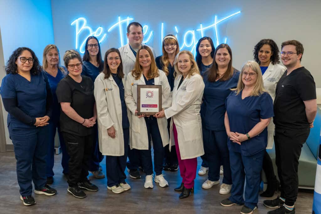 The Chicago Lighthouse Low vision Clinic Team posing for a photo with the Cooper Vision Award