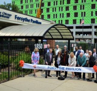 Board members cut the ribbon on the new Forsythe Pavilion.