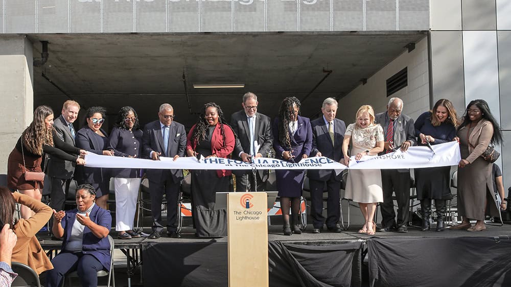 The Attendees cut the ribbon at the Foglia Groundbreaking