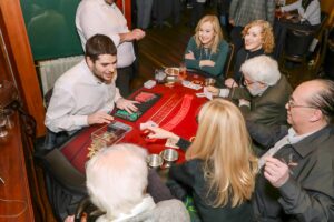 Alan Brint dealing black jack at last year's poker & casino night.